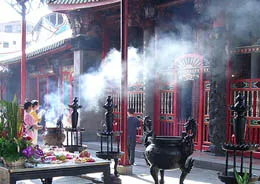 offering incense in a temple